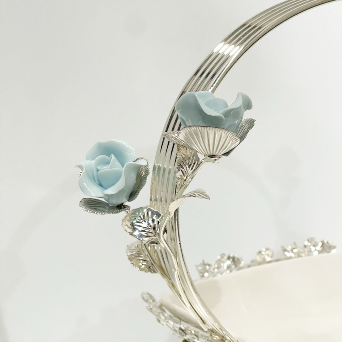 Elegant Silver Floral Basket with Porcelain Accents