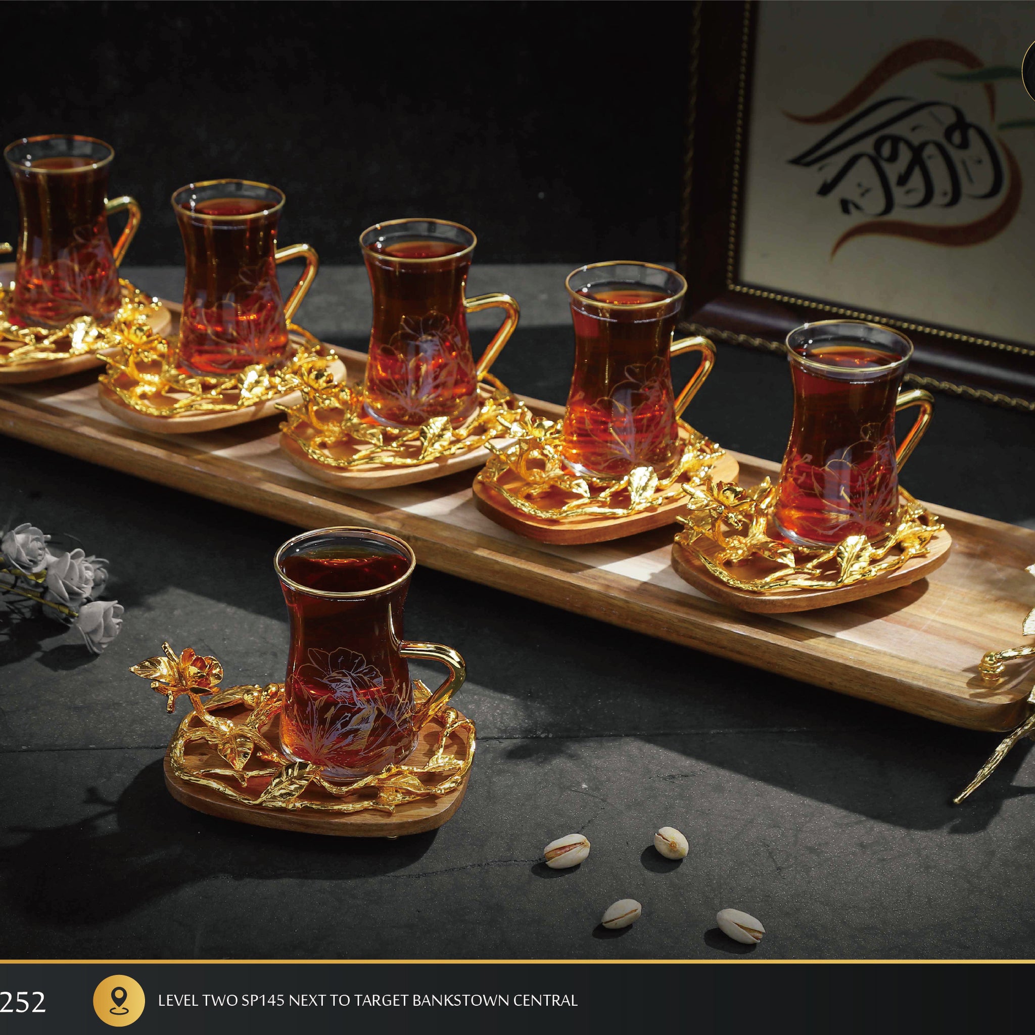 Luxurious Gold-Plated Turkish Tea Set – 6 Glass Cups with Ornate Saucers & Wooden Tray