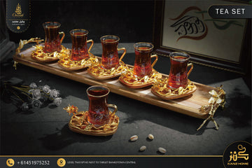 Luxurious Gold-Plated Turkish Tea Set – 6 Glass Cups with Ornate Saucers & Wooden Tray